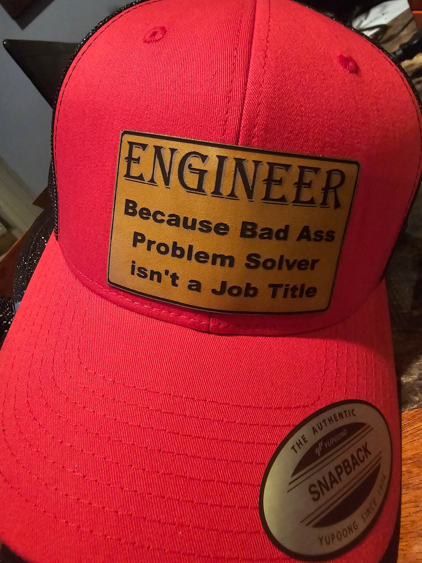 Hat Engineer, because bad ass problem solver is not a job title